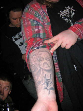 Kaj's tattoos: King Diamond and the Bathory goat.